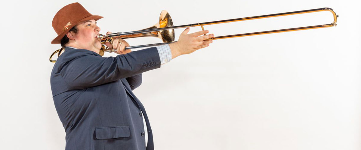 Dan Blacksberg pictured playing trombone