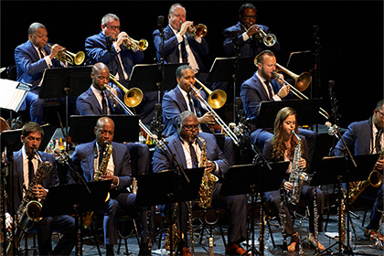 Jazz at Lincoln Center Orchestra performing on stage.