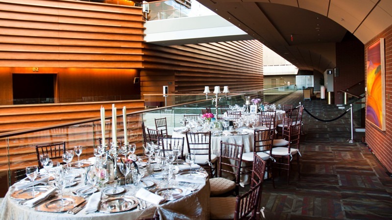 Guests who prefer eating indoors can be seated against the railing, which offers a beautiful view of the Kimmel Center.