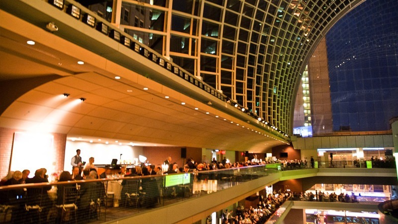 Guests enjoy their meals while admiring the view of the Kimmel Center that the First Tier Lounge offers.